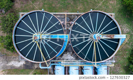 Aerial view circular clarifier tank at watewater treatment plant, Industrial infrastucture, Environment technology sustainable water management system, Semimentation tank circular clarifier. 127630327