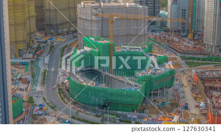 June 8 2025 Modern Residential Complex and Construction Site Amid Hill 127630341