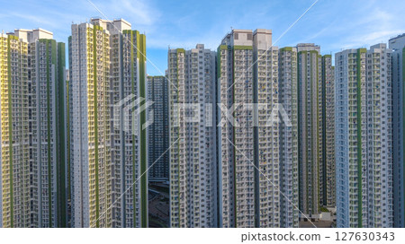 June 8 2025 Building Cluster Against a Bright Sky in Urban Setting 127630343