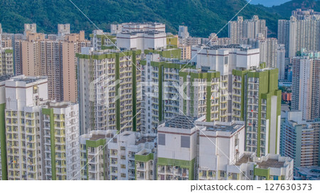 June 8 2025 Building Cluster Against a Bright Sky in Urban Setting 127630373