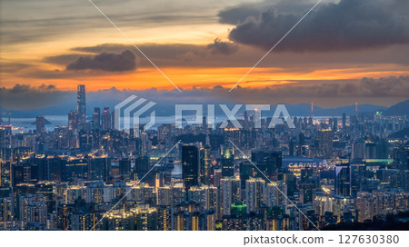 June 8 2025 Cityscape Skyline During Twilight Featuring Urban Lights and Vibrant Skies 127630380