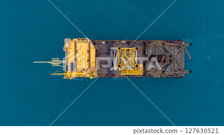 Aerial view offshore Oil and Gas production platform, Heavy duty marine engineering structure for energy and petrochemical industry, Offshore oil rig energy infrastructure marine engineering, Offshore 127630521