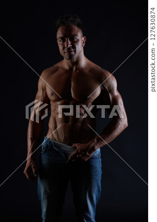 male model - fitness addicted shot in studio background 127630874