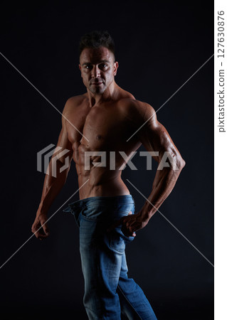 male model - fitness addicted shot in studio background 127630876