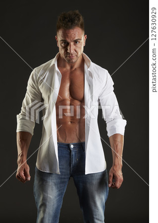 male model - fitness addicted shot in studio background 127630929