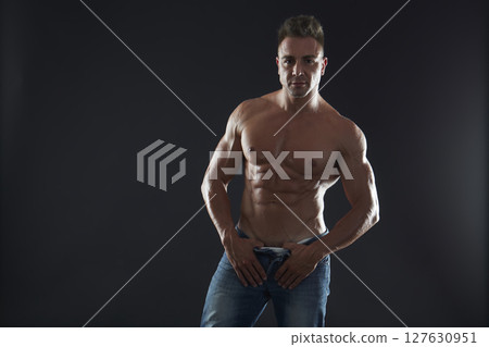 male model - fitness addicted shot in studio background 127630951