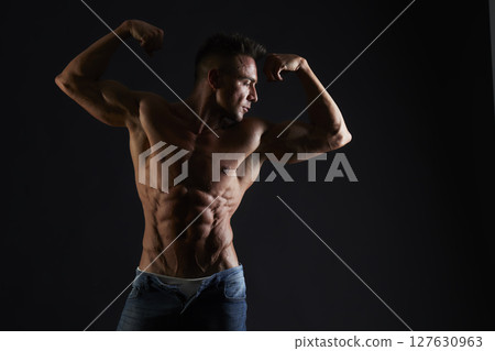 male model - fitness addicted shot in studio background 127630963