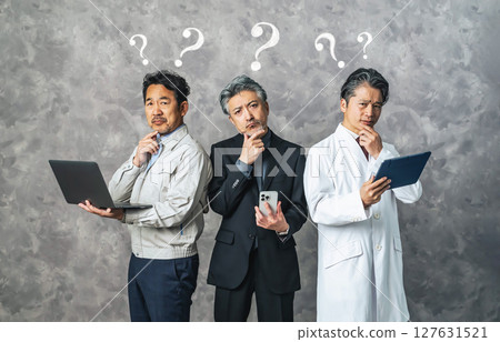 Group of middle-aged men from various professions having trouble with digital devices 127631521