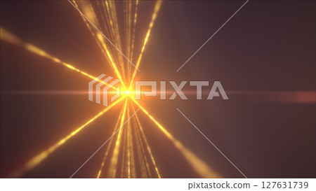 A golden explosion of light rays bursts outward in a radial pattern from a central glowing point 127631739