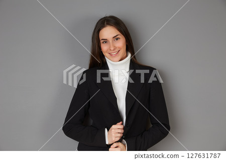 young female doctor in studio background 127631787