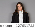 young female doctor in studio background 127631788