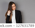 young female doctor in studio background 127631789