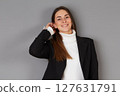 young female doctor in studio background 127631791