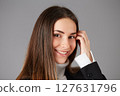 young female doctor in studio background 127631796