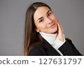 young female doctor in studio background 127631797