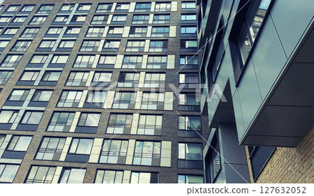 Architecture and real estate, modern residential apartment building with large panoramic windows 127632052