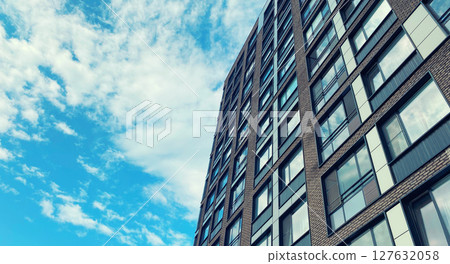 Architecture and real estate, modern residential apartment building with large panoramic windows Architecture and real estate, modern residential apartment building with large panoramic windows 127632058
