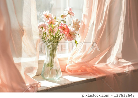 Soft Pastel Floral Arrangement in Glass Vase on Sunny Window Sill 127632642