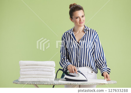 Ironing with a smile Ironing with a smile 127633288
