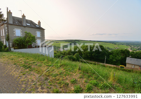 Vineyards at sunset as seen from the hills of Sancerre (France, June 8, 2025) 127633991