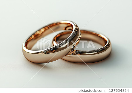 Pair of Wedding Rings on a white background. Pair of Wedding Rings on a white background. 127634834