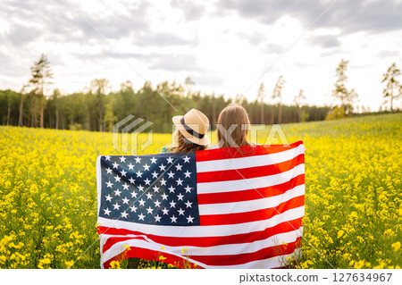 4th of July. Independence Day. Patriotic holiday. USA flag fluttering in the wind. 4th of July. Independence Day. Patriotic holiday. USA flag fluttering in the wind. 127634967