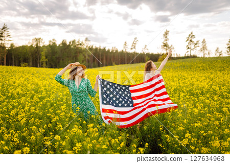 4th of July. Independence Day. Patriotic holiday. USA flag fluttering in the wind. 4th of July. Independence Day. Patriotic holiday. USA flag fluttering in the wind. 127634968
