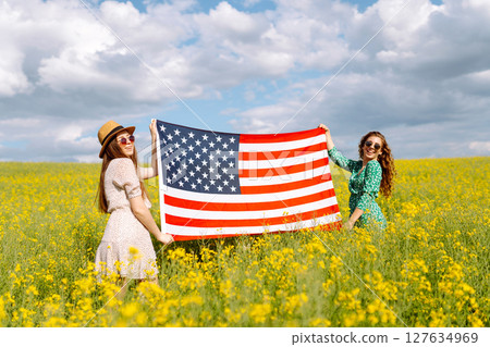 4th of July. Independence Day. Patriotic holiday. USA flag fluttering in the wind. 127634969