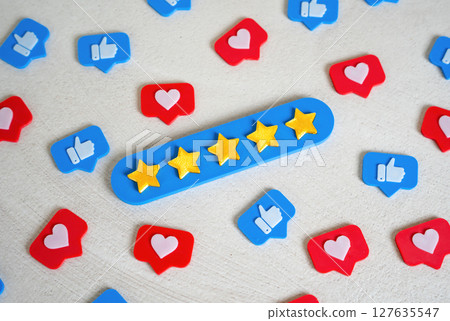 A five-star bar among social media likes. Social validation, high ratings, or quality recognition 127635547