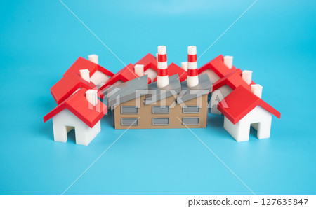 The factory is surrounded by houses. Residential infrastructure for workers 127635847