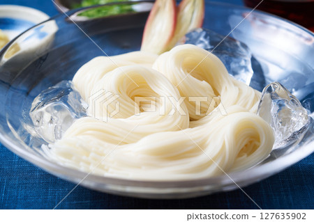 Somen noodles served on a glass plate 127635902