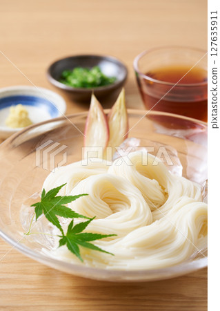 Somen noodles served on a glass plate Somen noodles served on a glass plate 127635911