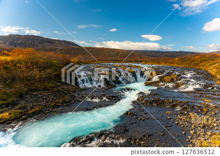 Blue Bruarfoss waterfalls in Iceland. Great tourist attraction 127636512