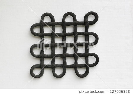 Celtic knot symbol on a wall Celtic knot symbol on a wall 127636538