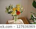 Flowers in a vase 127636969