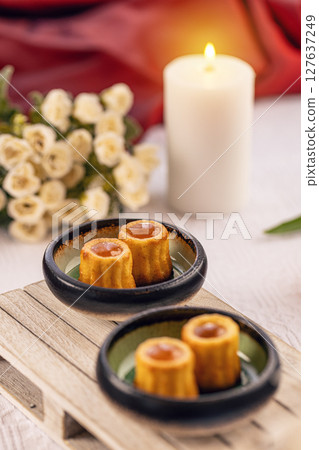 Small cakes with caramel filling 127637249