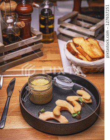 Chicken liver pate with caramelized quince 127637251