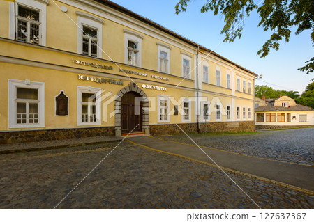uzhhorod, ukraine - jun 11, 2017: building of the uzhhorod national university, faculty of law on a sunny summer morning. historic architecture situated in the downtown 127637367
