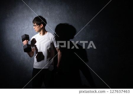 Men with dumbbells 127637463