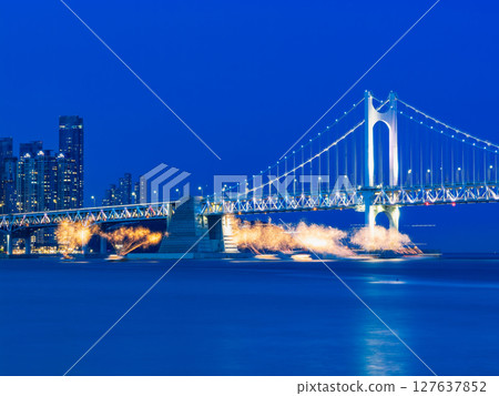 Busan: Illuminated Gwangan Bridge and fireworks on a boat Busan: Illuminated Gwangan Bridge and fireworks on a boat 127637852