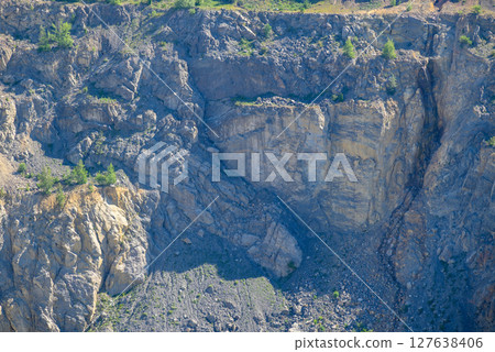 Heaps of tailings and mine dumps in Bor, Eastern Serbia, large copper mine owned by Chinese mining company Zijin Mining Group 127638406