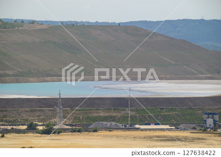 Heaps of tailings and mine dumps in Bor, Eastern Serbia, copper mine owned by Chinese mining company Zijin Mining Group 127638422