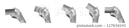A hand holding a premium credit card, front view, showcasing secure payment with chip for online 127639243