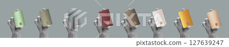 A hand holding a stylish, textured credit card. Fashionable design with chip for online payments, 127639247