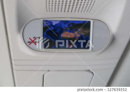 airBaltic main cabin monitor on the ceiling from Munich to Zurich in Germany. May 8, 2025 127639352