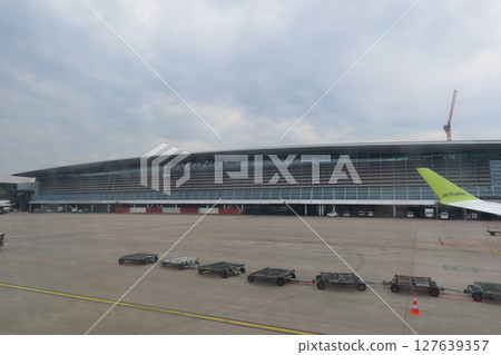 Zurich Airport building viewed from the aircraft on a cloudy day on May 8, 2025 Zurich Airport building viewed from the aircraft on a cloudy day on May 8, 2025 127639357