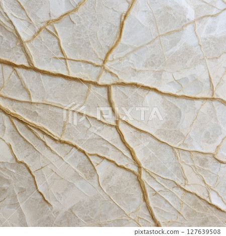 Truffle marble slab with pale beige base and subtle tan vein pattern 127639508