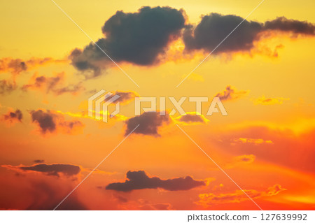 Dynamic sky with towering dark clouds and brilliant sunlight rays cutting through. Dynamic sky with towering dark clouds and brilliant sunlight rays cutting through. 127639992