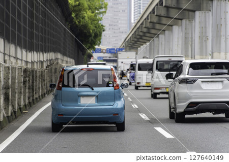 Private car driving on main roads Private car driving on main roads 127640149