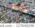 A photo of delicious looking shellfish being sold at the store. 127640296